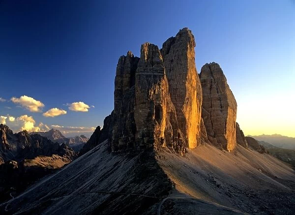 Three Pinnacles, Tre Cime di Lavoro view from Patern Saddle at sunset National Park Dolomiti di Sesto, Dolomites, South Tyrol, Alps, Italy