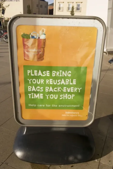 Framed Print : Poster encouraging reusable bags outside Sainsbury's Cheltenham UK Framed Print : Poster encouraging reusable bags outside Sainsbury's Cheltenham UK