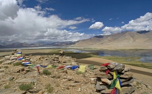 Prayer flags frame the twin lakes of the Tso Kar basin, Changthang, Ladakh, India