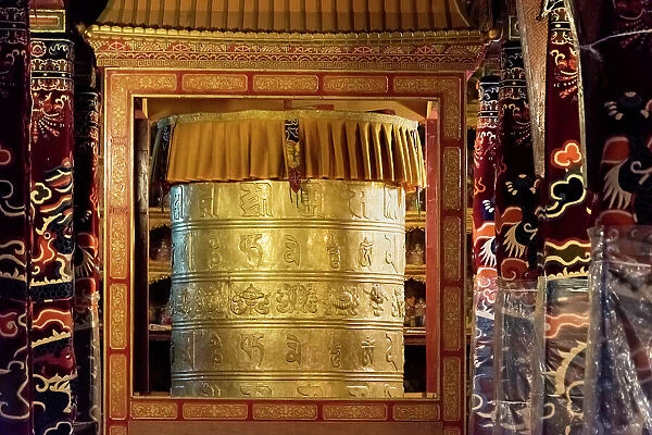 Prayer wheel inside Drepung Monastery, one of the great three Gelug university monasteries of Tibet, Lhasa, Tibet, China Date: 06-09-2018