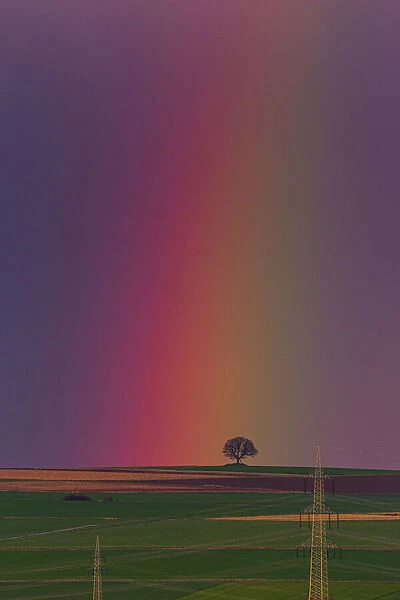 Rainbow, appearing over arable land, Lower Saxony, Germany