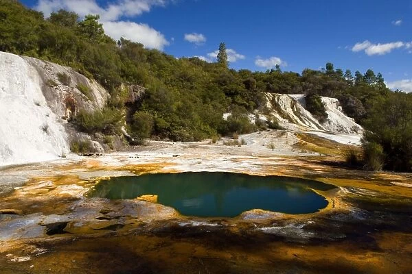 Rainbow and Cascade Terrace hot spring and colourful silica terrace formed by hot water algae growing in the geothermal area of Orakei Korako also called The Hidden Valley Orakei Korako, Waikato, North Island, New Zealand