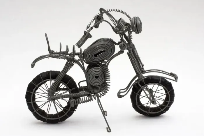 Framed Print : Recycling - Model of Harley-Davidson motorcycle made of scrap wire and inner tube Kenya Framed Print : Recycling - Model of Harley-Davidson motorcycle made of scrap wire and inner tube Kenya
