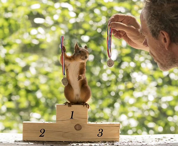 Red Squirrel and man with a medal