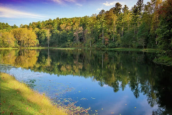 Reflections, Otter Lake, Blue Ridge Parkway, Virginia, USA. Date: 04-10-2018