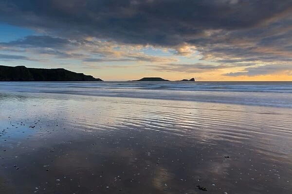 Rhossili - beach at sunset - Worms Head, Gower, Wales, UK