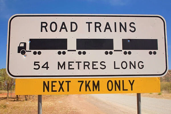 Roadtrain sign - a sign which warns of Roadtrains which can be up to 54 metres long. They must be passed very cautiously, because of their length - Western Australia, Australia