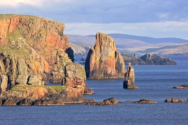 Rock formations steep cliffs and sea stacks Stoura Pund near Hillswick Northmavine, North Island, Shetland Isles, Scotland, UK