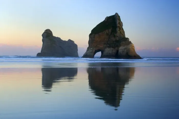 Framed Print : Rocky Islands - by powerful surf sculpted rock islands with caves and arches at Wharariki beach just before sunrise - Wharariki Beach, Golden Bay, Nelson District, South Island, New Zealand Framed Print : Rocky Islands - by powerful surf sculpted rock islands with caves and arches at Wharariki beach just before sunrise - Wharariki Beach, Golden Bay, Nelson District, South Island, New Zealand