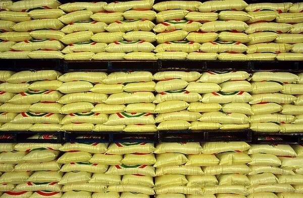 Sacks of rice stacked on shelves, ready for export Deniliquin, New South Wales, Australia JLR01548