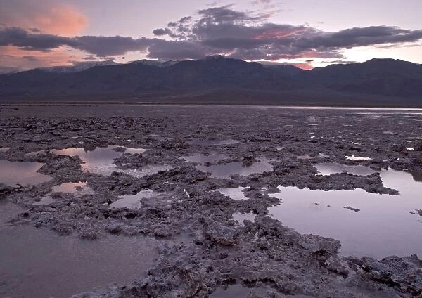 Salt Lake - at sunset, unusually full of water in high rainfall El Nino year. Death Valley National Park, USA