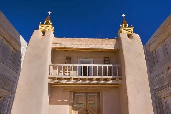 San Jose de Gracia Church - entrance portal of this historic church in adobe building style - Las Trampas, High Road to Taos, New Mexico, USA