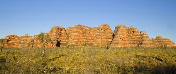 Sandstone Domes - famous banded, beehive-shaped domes, the world's most exceptional example of cone karst formations, in late evening light - Bungle Bungle National Park, Purnululu National Park, Western Australia, Australia