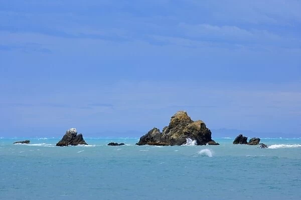 Sea Stacks jagged sea stacks amidst the South Pacific Ocean Kaikoura, Canterbury, North Island, New Zealand