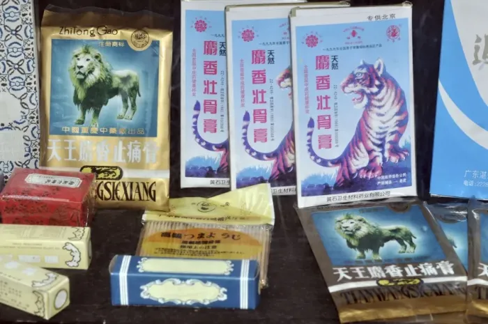 Framed Print : Selection of traditional Chinese medicine products featuring tiger parts and other animals Framed Print : Selection of traditional Chinese medicine products featuring tiger parts and other animals
