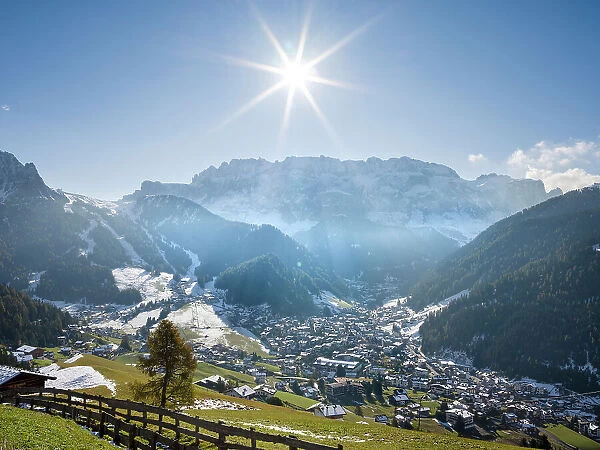 Sella mountain range and village Wolkenstein, Selva in the dolomites of South Tyrol, Alto Adige seen from Groden Valley, Val Gardena. The dolomites are listed as UNESCO World Heritage Site. Central Europe, Italy. Date: 18-10-2020