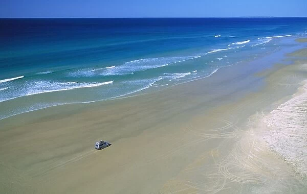 Seventy-five Mile Beach with 4WD vehicle; aerial, Fraser Island, Queensland, Australia JPF34617