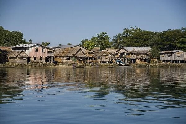 Shoreline houses at Busu village on Alite Island, Malaita, Solomon Islands. Presumably villages such as this one would have problems if sea levels rose due to global warming