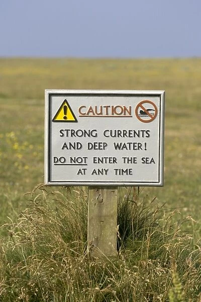 Sign - National Trust sign warning of swimming hazard, treacherous offshore currents Location: Loe Bar, nr. Helston, Cornwall, UK