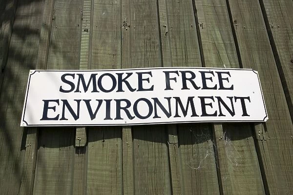 Sign - smoke free environment notice on cafe Rotorua, North Island, New Zealand