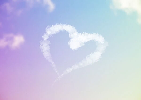 Sky Writing - heart written in the sky against clouds