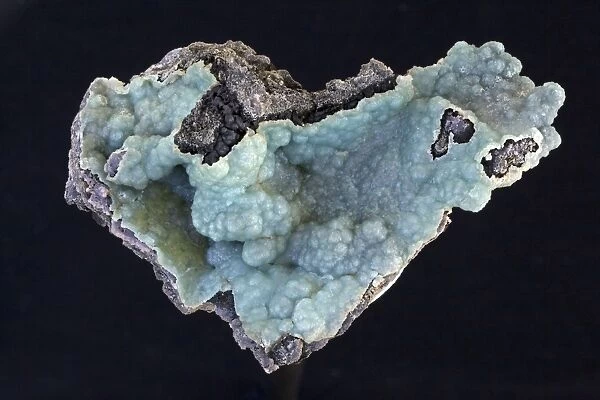 Smithsonite (zinc carbonate - ZnCO3) - Choix Sinoloa Mexico - A mineral ore of zinc - Also known as zinc spar - Discovered by and named for James Smithson whose bequest established the Smithsonian Institute - Colors range from white - grey - yellow
