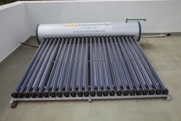 Framed Print : Solar thermal water heating system with tank and evacuated tubes on roof of house - Mombasa - Kenya Framed Print : Solar thermal water heating system with tank and evacuated tubes on roof of house - Mombasa - Kenya