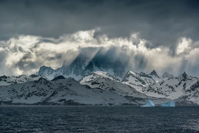 Framed Print : South Georgia Island. Opening in clouds and Virga reveal the mountainous and glaciated landscape. Date: 18-10-2019 Framed Print : South Georgia Island. Opening in clouds and Virga reveal the mountainous and glaciated landscape. Date: 18-10-2019