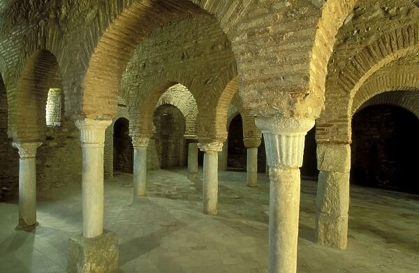 Spain - Brick horseshoe arches in the tenth-century mosque of Almonaster La Real in the Sierra de Aracena. Province of Huelva, Andalucia, Spain