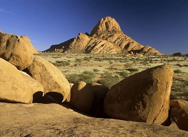 Spitzkoppe Mountain with rocks and boulders in early morning light Pandok Mountains, Spitzkoppe area, Namibia, Africa