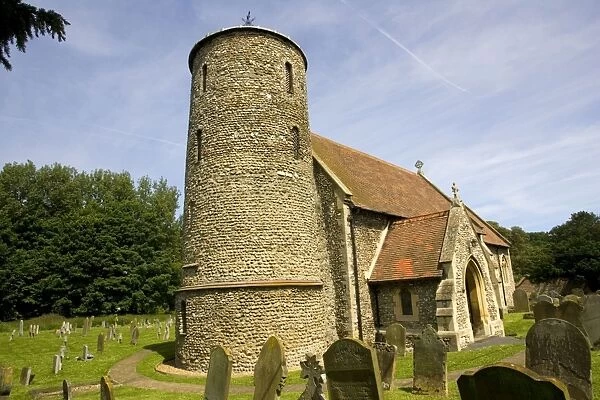 St Marys Church with round stone tower Burnham Deepdale Norfolk UK