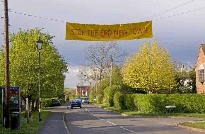 Framed Print : Stop eco new town banner across road Long Marston near Stratford UK Framed Print : Stop eco new town banner across road Long Marston near Stratford UK