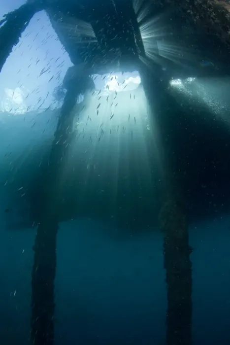Framed Print : Sunrays under the Air Manis Jetty - Ambon - Indonesia