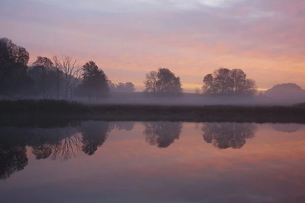 Sunrise - with reflections in lake - Denmark