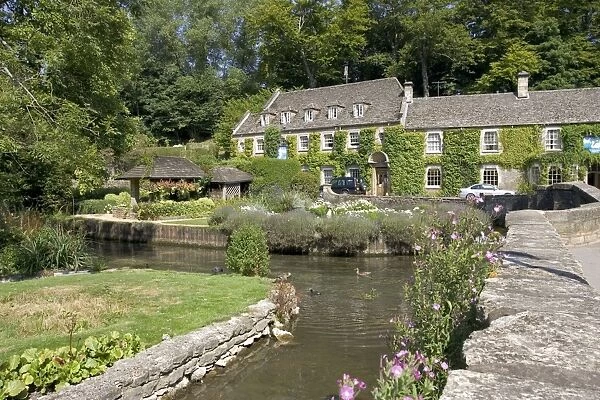 Swan Hotel by River Coln at Bibury, Cotswolds, UK