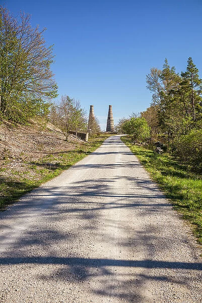 Sweden, Gotland Island, Bungenas, former chalk mine and military base, now an exclusive vacation development and nature preserve, smokestacks of former lime factory Date: 15-05-2019