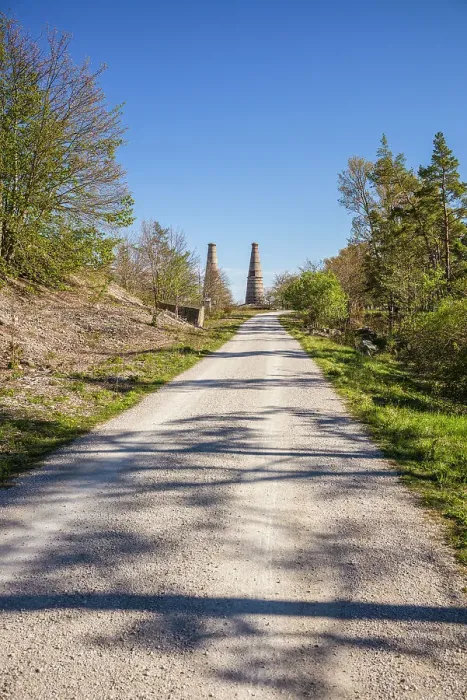Framed Print : Sweden, Gotland Island, Bungenas, former chalk mine and military base, now an exclusive vacation development and nature preserve, smokestacks of former lime factory Date: 15-05-2019 Framed Print : Sweden, Gotland Island, Bungenas, former chalk mine and military base, now an exclusive vacation development and nature preserve, smokestacks of former lime factory Date: 15-05-2019