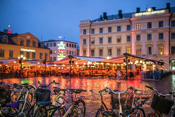 Sweden, Linkoping, cafes and bars on Stora target square, dusk Date: 18-05-2019