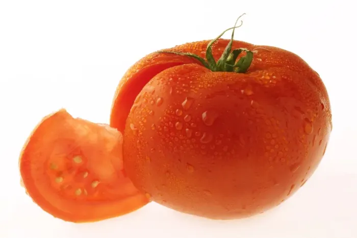 Framed Print : Tomato. LA-1069. Tomato - showing seeds in cut portion