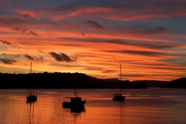 Tonga, South Pacific - Sunset, Harbor of Neiafu, Vava'u group Humpback Whale watching excursions start from this harbor