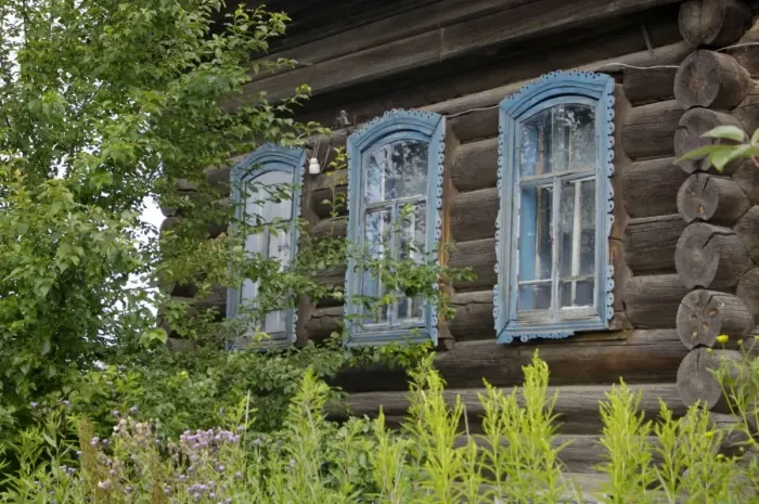 Framed Print : A traditional front of an early 19th century wooden house in village Karaul, which used to be a customs check-point settlement on a famous Babinov's road from European Russia to Siberia in 17-19th centuries; now desolated as well as Framed Print : A traditional front of an early 19th century wooden house in village Karaul, which used to be a customs check-point settlement on a famous Babinov's road from European Russia to Siberia in 17-19th centuries; now desolated as well as