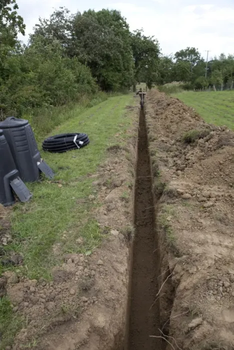 Framed Print : Trench dug out in field to carry electric cable ducting - Cotswolds - UK Framed Print : Trench dug out in field to carry electric cable ducting - Cotswolds - UK