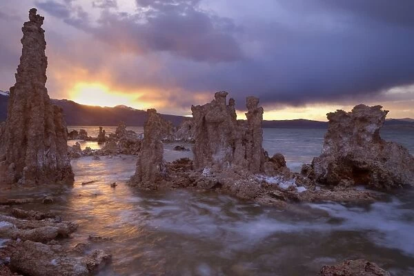 Tufa Formations - on the shores of Mono Lake with the snow-covered mountains of the Sierra Nevada in the background - at sunrise - Mono Lake - California - USA