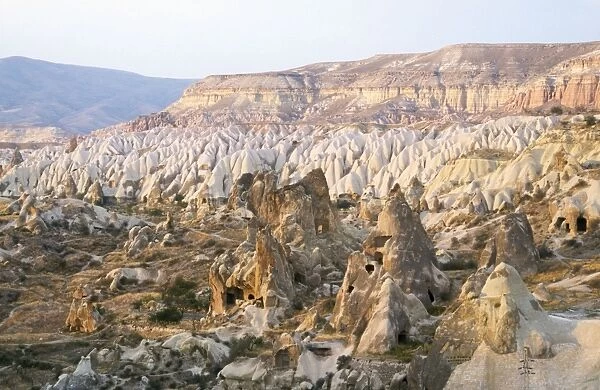 Turkey - View from Goreme, Cappadocia. Cave dwelling cared in the Tuff volcanic ash