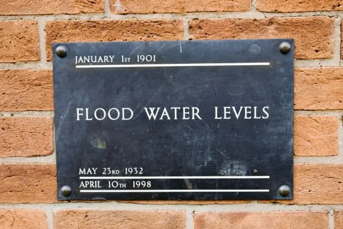 Framed Print : UK - Brass plate displaying high flood levels on wall of house in Stratford upon Avon Framed Print : UK - Brass plate displaying high flood levels on wall of house in Stratford upon Avon