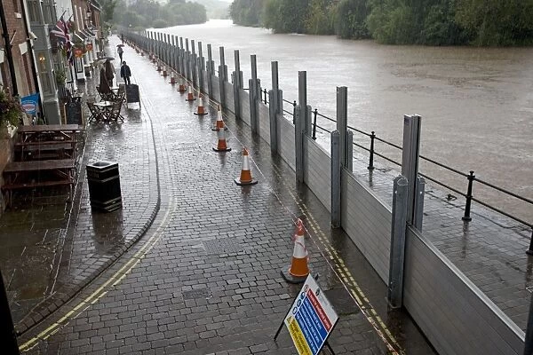 UK - Flood barriers protecting riverside houses along rising River Severn Bewdley Worcestershire