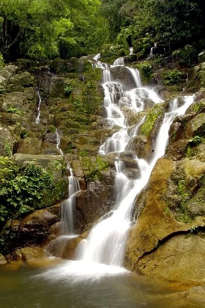 An upper part of Mukut Waterfalls, surrounded by rainforest; near Mukut village on Tioman Island, 30 km east off peninsula Malaysia in South China Sea; June. Ma39. 3785