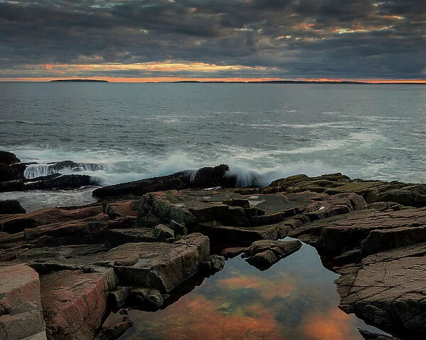 USA, Maine, Acadia National Park. Moody sunset on ocean coastline. Date: 17-10-2021