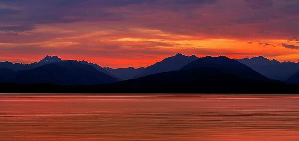 USA, Washington State, Seabeck. Composite panoramic sunset over Hood Canal. Date: 31-07-2021