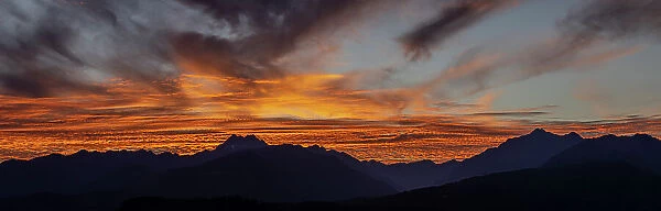 USA, Washington State, Seabeck. Panoramic sunset over Olympic Mountains. Date: 24-09-2021